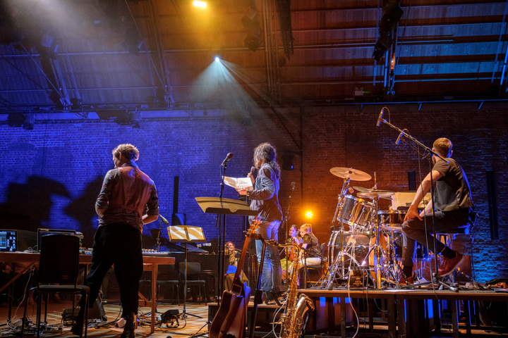 Subatomic by Christo Squier and Dr. Teppei Katori. A Concert with projections of subatomic particles at snape maltings concert hall.