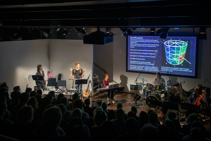 Subatomic by Christo Squier. A live concert with projections, a chamber orchestra and a lecture about subatomic particles at Science Gallery London.