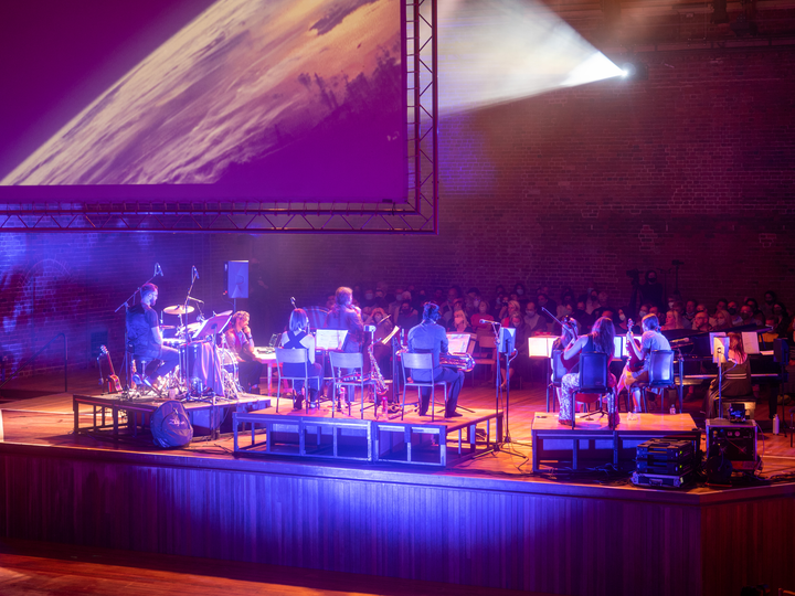 Subatomic by Christo Squier. Concert with projections of earth at snape maltings concert hall.